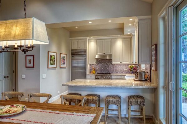 Soda Kitchen – Featuring Wood-Mode painted white cabinetry, Quartzite countertops, Walker Zanger Contessa backsplash