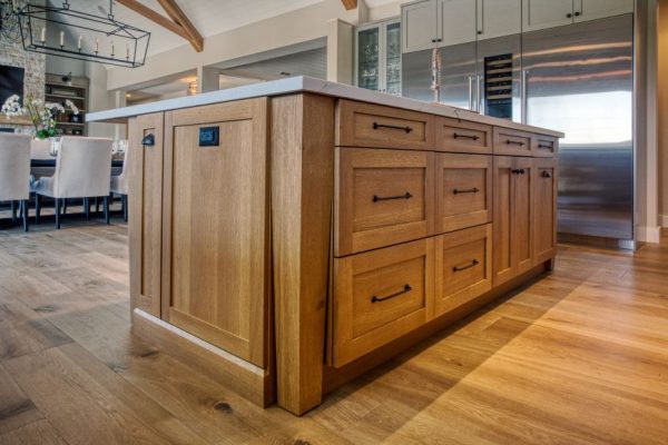 Modern Farmhouse. Cabinets by Wood-Mode painted in Nimbus color with the island made in rift cut white oak. Cambria quartz countertops. Floating shelves. Sub Zero and Wolf appliances.