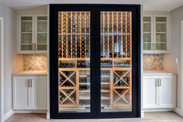 This amazing kitchen is featuring Bellmont 1900 cabinetry with hardware Top knobs. Faucet by Brizo Artesso collection. Backsplash by Sonoma Tile Makers and Akdo.