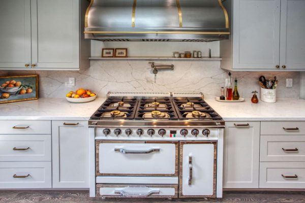 Transitional Kitchen with Sonoma Tile Backsplash cabinets by Dura- Supreme the Island is Knotty Alder Sesame with Cerino gold countertop.