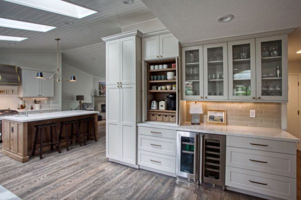 Transitional Kitchen with Sonoma Tile Backsplash cabinets by Dura- Supreme the Island is Knotty Alder Sesame with Cerino gold countertop.